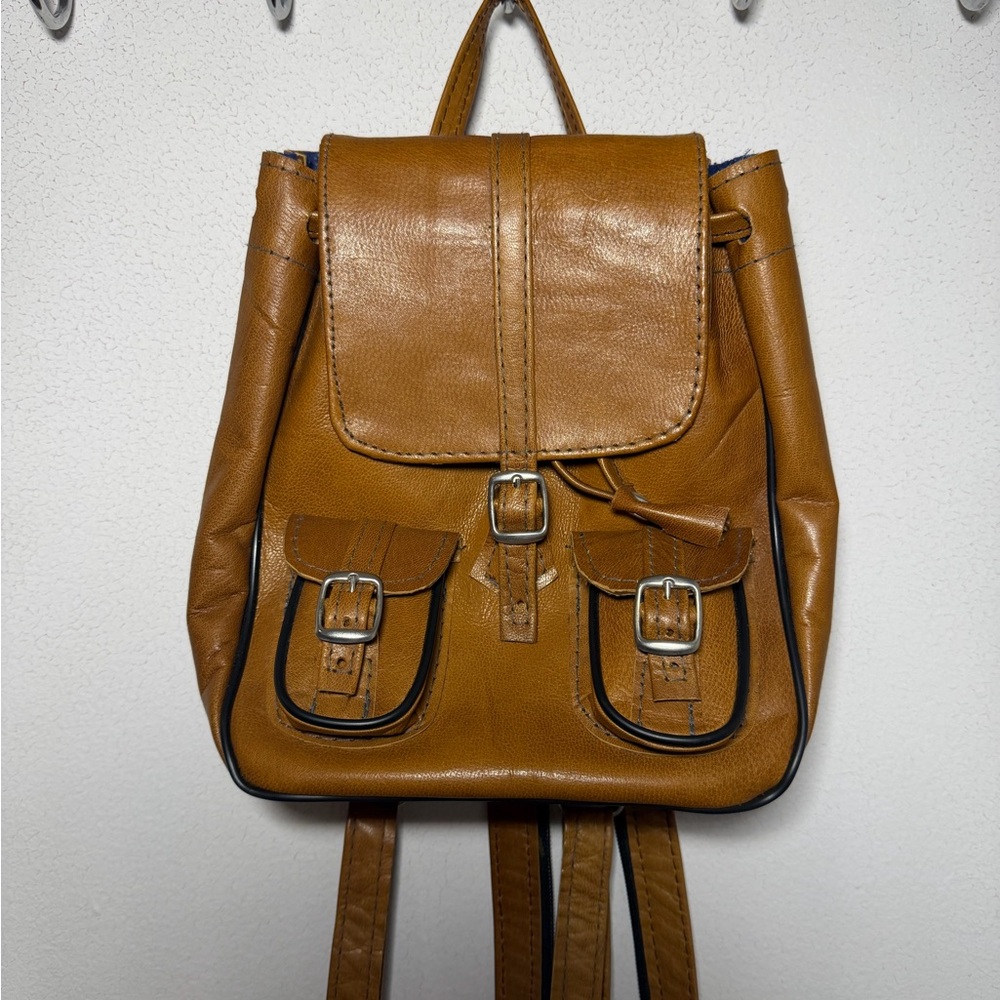 Classic Tan Leather Backpack with Front Buckle Pockets